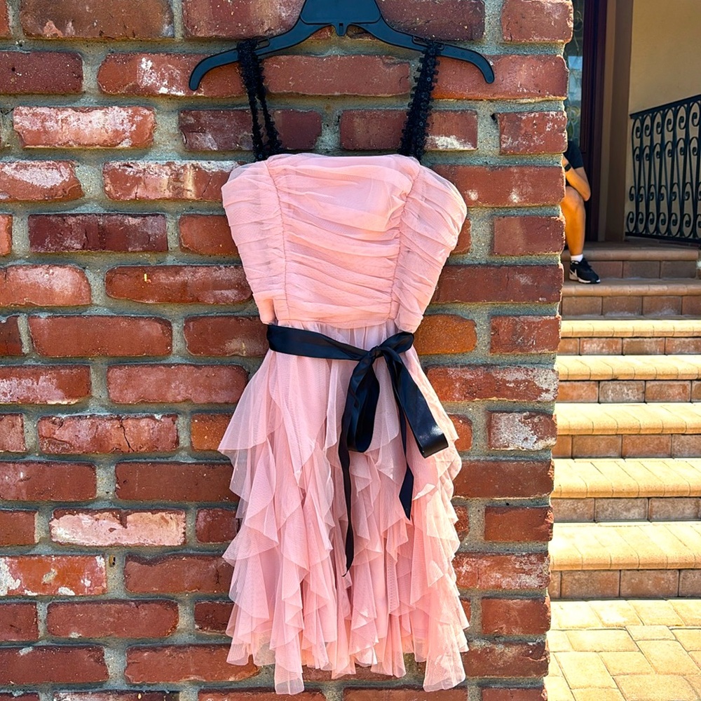 Women’s pink and black dress